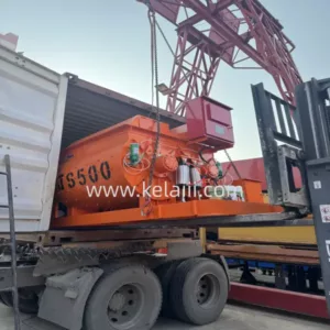 Concrete mixers are loaded into containers.
